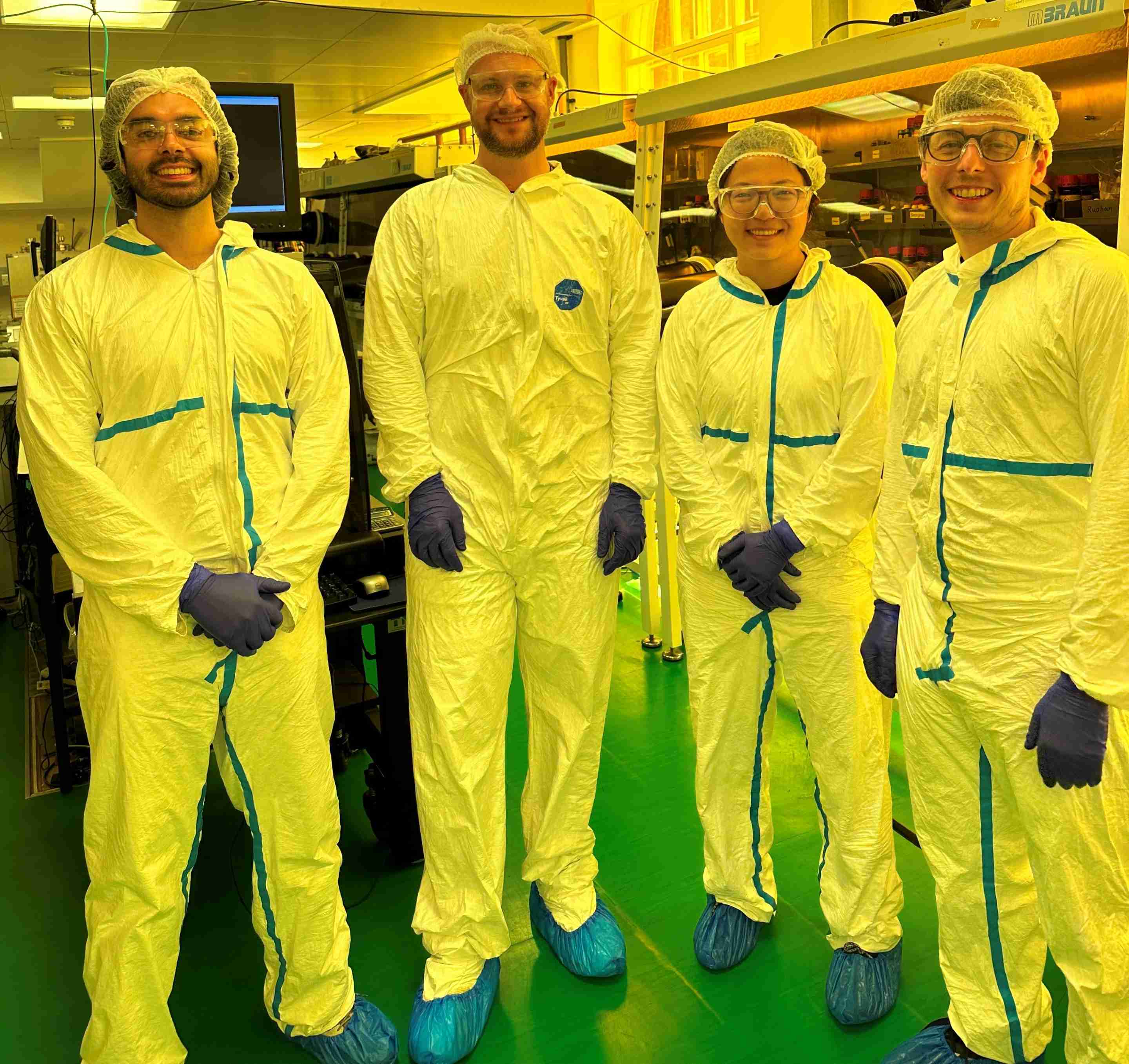 Boer (second from right) is pictured in a laboratory at the University of Oxford