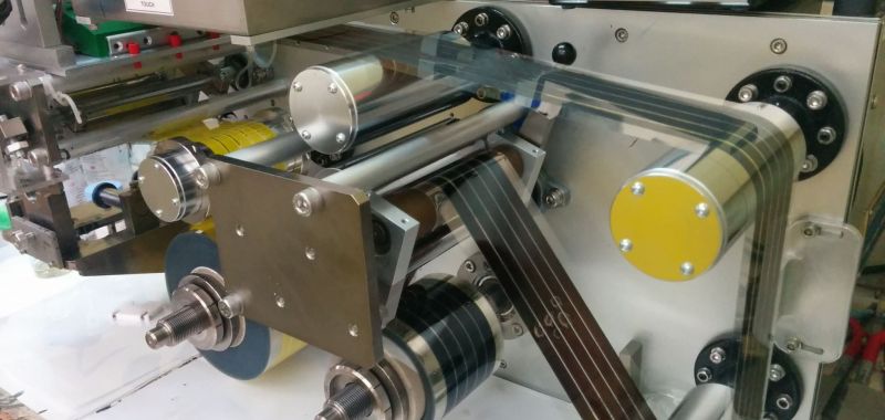 An image of a roll to roll device for printing perovskite solar cell materials