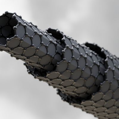 A 3D graphical rendering of a multi-walled carbon nanotube, consisting of three cyclinders built from grey hexagonal structures joined together.